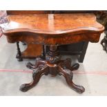 A 19th century walnut card table