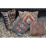 Four various antique kelim cushions