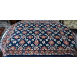 Persian Veremin rug with floral design on a blue ground