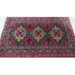 Persian NW green ground rug