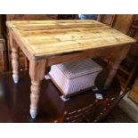An old stripped pine kitchen table