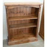 A waxed pine open bookcase