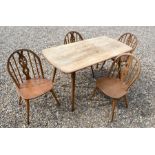 Ercol Windsor elm and beech dining table and four chairs