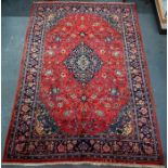 A Persian Sarouk carpet, 335 cm x 230 cm