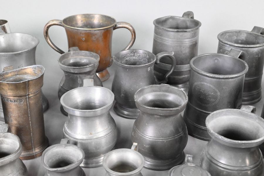 Over fifty Victorian and later pewter and other measures - Image 5 of 7