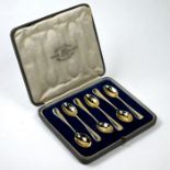 A cased set of six silver gilt Hanoverian rat-tail coffee spoons