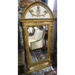A late 19th century arched giltwood mirror