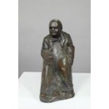 A bronzed resin figure of Winston Churchill, signed Ravera