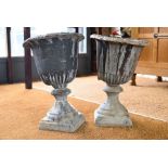 A pair of antique lead urns, 40 cm h x 29 cm dia