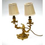 A vintage rococo style gilt metal lamp