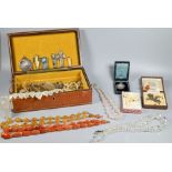 Jewel box containing collection of vintage costume jewellery