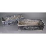 A pair of antique rectangular lead planters