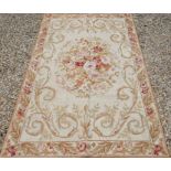 Two traditionally executed Aubusson style floral decorated rugs