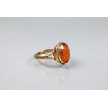 An oval amber ring