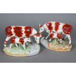 Pair of 19th century Staffordshire pottery cows with calves