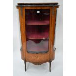 A late 19th century French inlaid kingwood serpentine vitrine cabinet