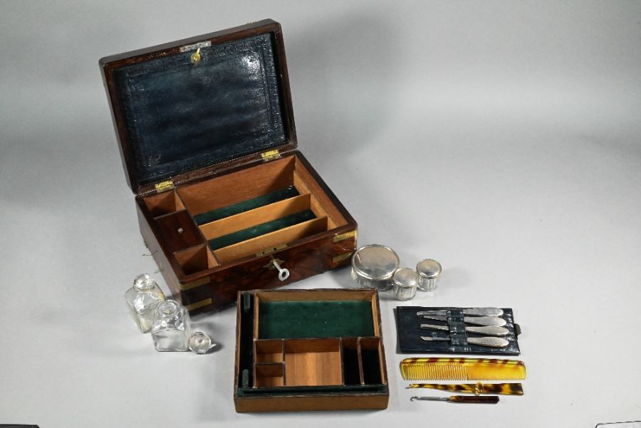 A 19th century brass-bound rosewood toilet case