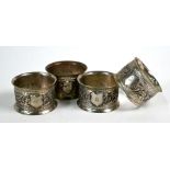 Four Indian white metal napkin rings