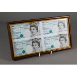 A framed block of four five pound notes