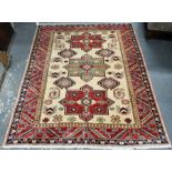 A contemporary Turkish Caucasian design cream/red rug