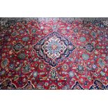 A Persian Kashan carpet, 360 cm x 250 cm