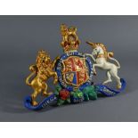 A cold painted lead Royal Coat of Arms