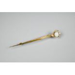 A 15ct gold sword brooch set with opal and two pearls