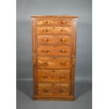 A Victorian oak seven drawer Wellington style chest