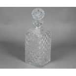 An unusually large square cut glass decanter and stopper