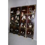A Chinese lacquered four panel screen with painted and applied hardstone decorarionn