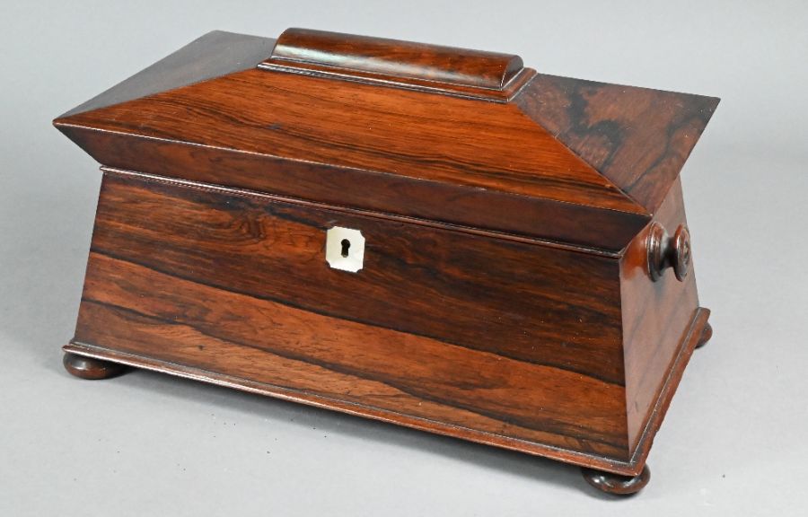 A Victorian rosewood sarcophagus form two compartment tea caddy