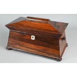 A Victorian rosewood sarcophagus form two compartment tea caddy