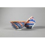 A pair of 18th Chinese Queen Charlotte pattern tea bowls, Kangxi period, Qing dynasty, Meissen marks