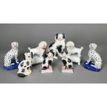 Pair of Staffordshire pottery dalmatians and other pottery animals