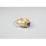 A tanzanite and diamond Art Deco style ring