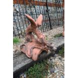 A large cast terracotta dragon ridge tile