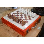 Carved onyx chess set and board in fitted case