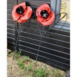 A pair of large garden 'poppy' spikes (2)