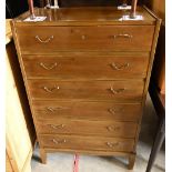 A mid century chest of six drawers with brass handles on tapering square legs, 70 cm wide x 39 cm