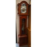 A reproduction longcase clock, with silvered dial and moonphase arch with glazed case and bi-metal