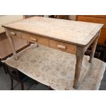 A pine and oak kitchen table with three drawers and gun barrel turned legs, 150 cm long x 89 cm wide