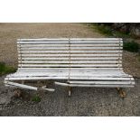 An old wood slat wrought iron garden bench a/f, 182 cm long