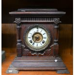 Stained wood wall clock with thirty-one day movement to/w a German mantel clock (2)
