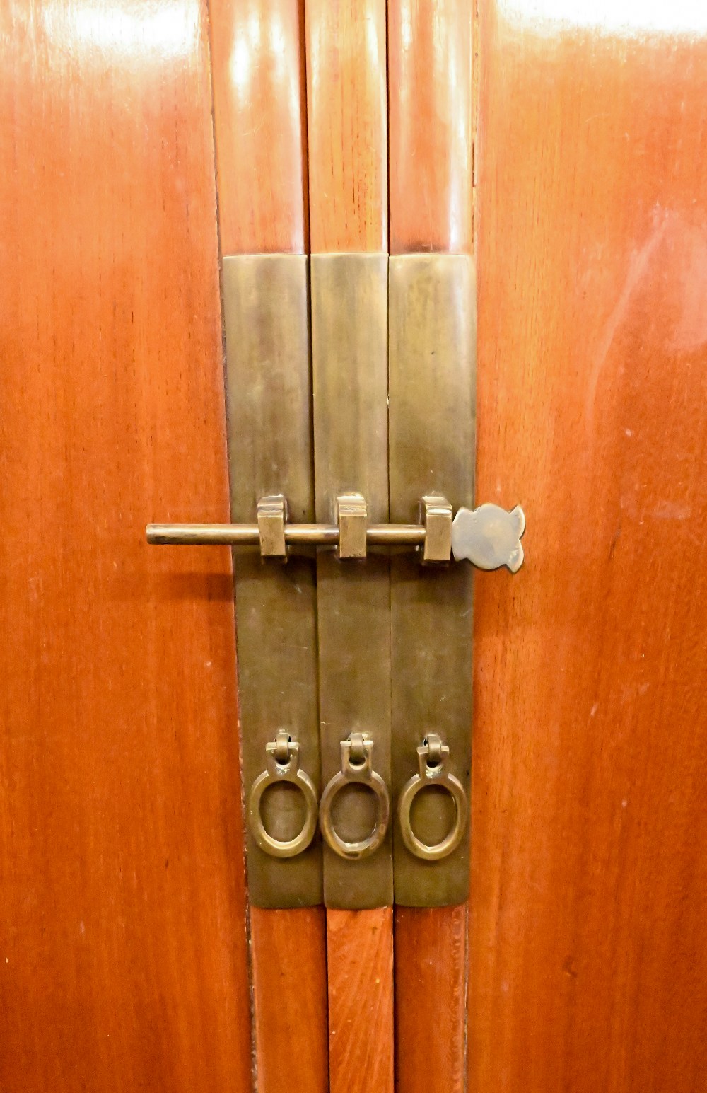 A Chinese hardwood and brass mounted two door cupboard, the interior fitted with shelves and two - Image 2 of 4