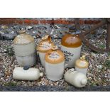 Assorted vintage stoneware jars, including; Strong & Co. Romsey; Magdale Vinery; May & Co.