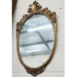 Oval hall mirror in Rococo style gilt frame, 85 cm high x 48 cm wide