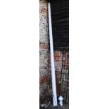 A fibreglass folding flag pole and finial