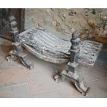 An old cast iron fire grate to/w a pair of dogs (3)