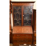 Edwardian Sheraton revival bureau bookcase inlaid with decorative neo-classical designs, 92 cm