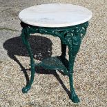 A cast iron Britannia terrace table with circular travertine top, 62 cm dia. x 65 cm h